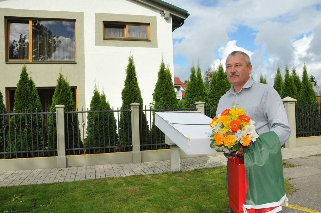 FOTO: Sveic sakoptāko ēku saimniekus