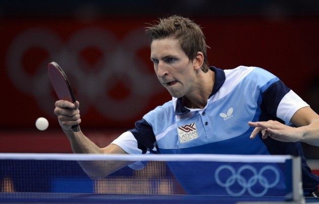 Galda tenisists Burģis ar diviem zaudējumiem sāk olimpisko kvalifikācijas turnīru